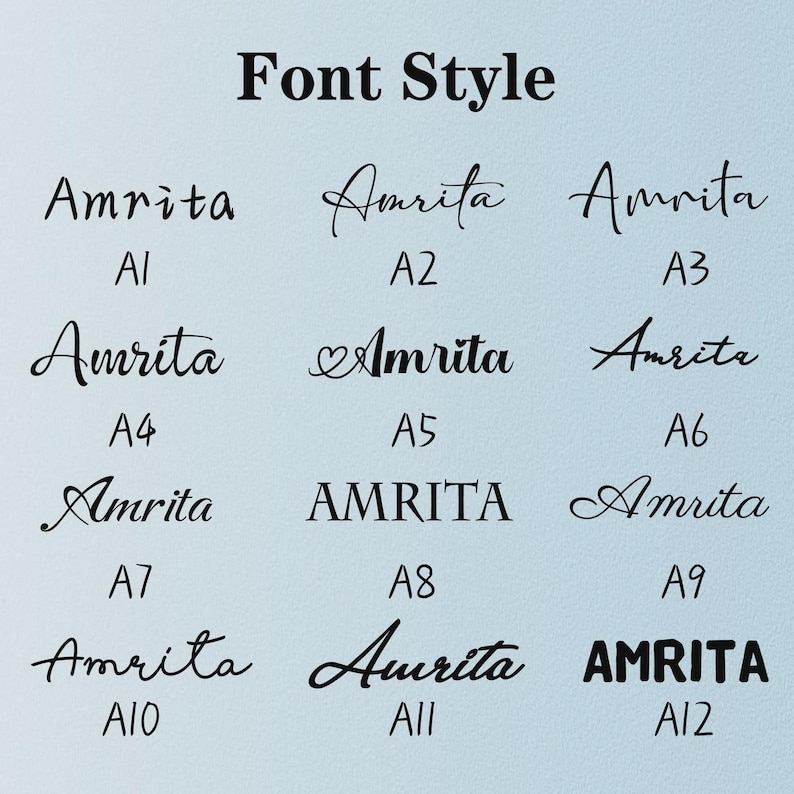May include: A font style chart displaying twelve variations of the name Amrita in black text on a light blue background. Each option is labeled with an alphanumeric code from A1 to A12, showcasing diverse typographic styles including script, serif, and sans-serif.