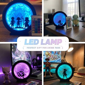 Puede incluir: L&aacute;mpara LED circular con siluetas de personajes de anime e iluminaci&oacute;n LED que cambia de color. Incluye un mando a distancia para ajustar el color de la luz. Un regalo perfecto para los fans del anime.