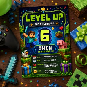 May include: A rectangular birthday invitation card featuring a pixelated video game theme with the text LEVEL UP AND CELEBRATE 6 OWEN IS TURNING 6. The design includes a character holding a sword, a pig, a chicken, and gift boxes on a dark background.