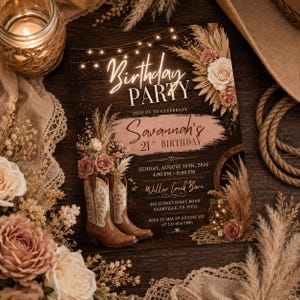 May include: A birthday party invitation card featuring a dark wood background, string lights, and dried floral arrangements. The text reads Birthday PARTY, Savannah's 21st BIRTHDAY, Sunday, August 16th, 2026, 4:00 PM - 8:00 PM, Willow Creek Barn.