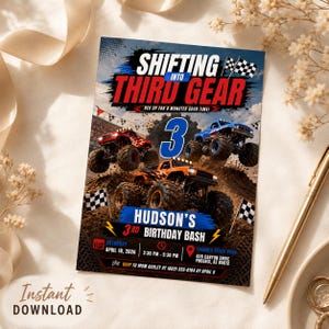 May include: A rectangular birthday invitation card featuring three monster trucks on a dirt track. The text reads SHIFTING INTO THIRD GEAR, HUDSON'S 3RD BIRTHDAY BASH, SATURDAY APRIL 18, 2026, 2:30 PM - 5:30 PM, and THUNDER TRACK PARK 455 CANYON DRIVE PHOENIX, AZ 85012.