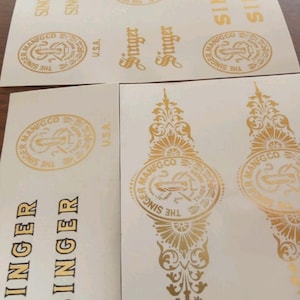 Decalques para decoração e restauro de máquinas de costura antigas