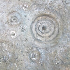May include: Abstract artwork in a neutral colour palette. The painting features concentric circles and organic shapes in shades of grey, white, and beige. The artist's signature is in the lower right corner.