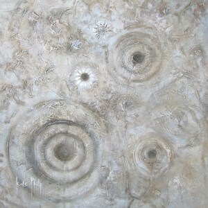 May include: Abstract textured painting in neutral tones. The artwork features layered textures and circular patterns, with a mix of light and dark shades. The artist's signature is visible in the lower left corner. The overall effect is a blend of depth and subtle detail.