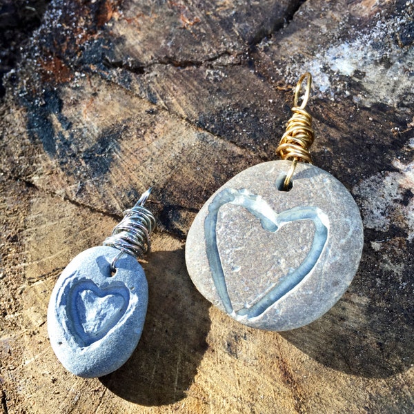 Hand-carved river rock stone heart pendant