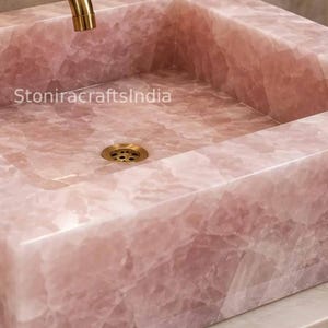 Interior Stone Art
Luxury Bath Accent
Pink Mineral Decor
Bathroom Art Sink
Vanity Design Piece
Exclusive Home Art
Luxury Sink Style
Boutique Bath Sink
Stone Vanity Decor
Resort Bath Style
Upscale Vanity Art
Natural Quartz Art
Luxury Interior Art
Designer Bath Sink
Handmade Stone
Rose Quartz Basin
Pink Crystal Sink
Gemstone Vessel
Luxury Vanity Sink
Natural Stone Sink
Handmade Basin
Designer Bathroom
Spa Inspired Sink
Premium Stone Basin
Custom Vanity Sink
Wash Basin sink 
Bathroom Vanity Decor