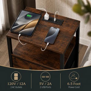 May include: A brown nightstand with a black metal frame. A tablet and smartphone are charging on the top surface. The nightstand has two AC outlets, two USB ports, and a 6.5-foot power cord.