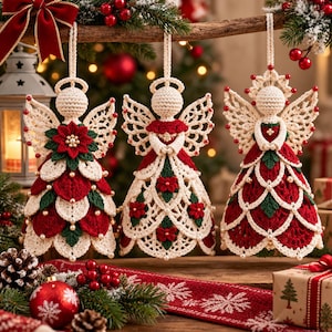 May include: Three crocheted angel ornaments hanging from a branch. Each angel features cream-colored yarn bodies, intricate lace wings, and red and green floral accents. The figures are adorned with small white beads and red berries.