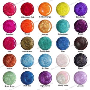May include: A selection of 24 circular resin samples in various colours, each labelled with its name. Shades include red, orange, yellow, purple, green, blue, brown, white, and black. The text "KGN HANDICRAFTSIN" is visible.