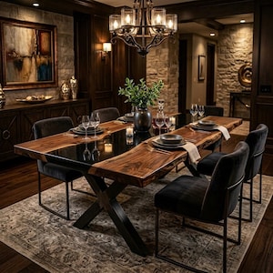 May include: A dining room featuring a large, dark wood table with a black surface and live edge detailing. The table is set with place settings and surrounded by black velvet chairs. A chandelier hangs above, and a rug is beneath.