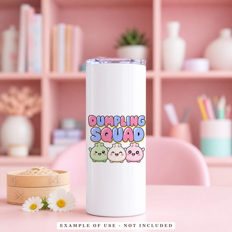 A white tumbler with the text "DUMPLING SQUAD" above three smiling, pastel-colored dumpling characters.