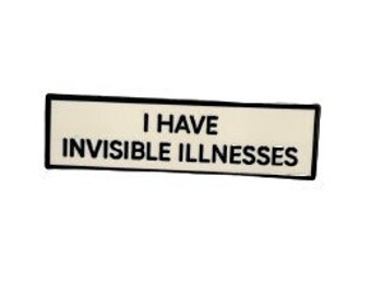 May include: Black and white rectangular sign with the text "I HAVE INVISIBLE ILLNESSES" printed on a white background.