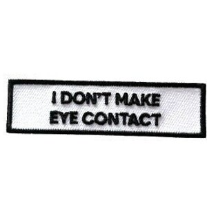 Puede incluir: Parche rectangular blanco con borde negro y texto que dice "I don't make eye contact".