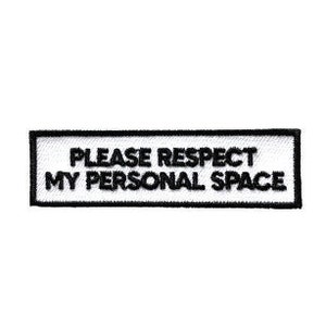 May include: Black and white iron-on patch with the text "Please respect my personal space".