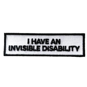 May include: White rectangular patch with black text that reads "I have an invisible disability."