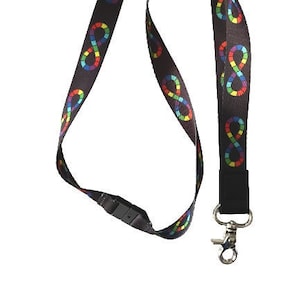 May include: A black lanyard with a rainbow infinity symbol design. The lanyard has a metal clip.