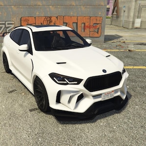 May include: A white luxury coupe with black accents, including black wheels, a black grille, and a black roof. The car has a sleek, modern design and is parked on a paved surface. The car has a license plate.
