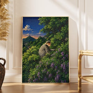 May include: A framed wall art print depicting a gray monkey perched in a lush green tree with purple flowers. The background features a mountain landscape under a twilight sky with a distant structure on the peak and a soft sunset glow.