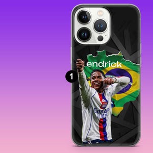 May include: A smartphone case featuring a graphic of a soccer player in a white jersey with red and blue accents, positioned in front of a map of Brazil with the Brazilian flag pattern. The name endrick is printed above the player in white text.