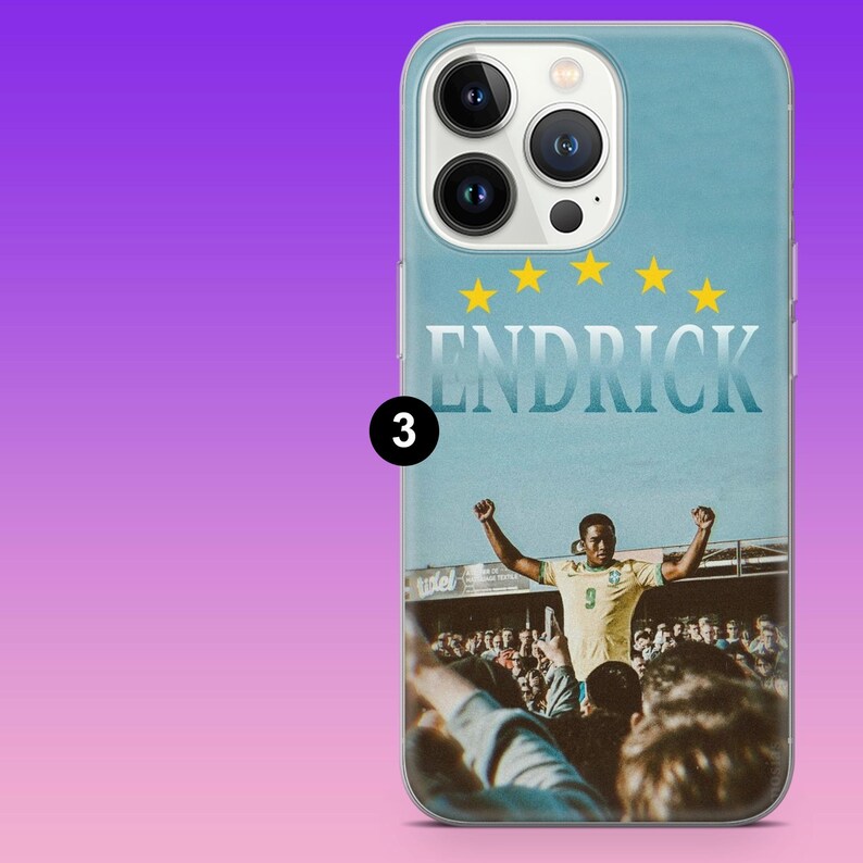 May include: A light blue smartphone case featuring a graphic of a soccer player in a yellow jersey with the number 9, arms raised in celebration before a crowd. The name ENDRICK is printed in white above the player, with five yellow stars.