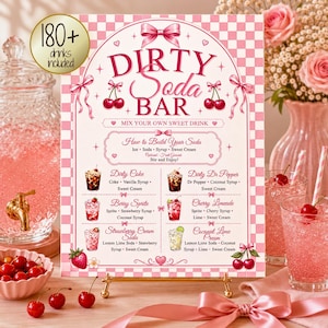 May include: A rectangular sign with a pink and white checkered border titled Dirty Soda Bar. It features instructions for building a soda, a list of six drink recipes, and illustrations of cherries and bows. A gold circle badge reads 180+ drinks included.