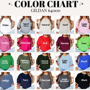 May include: A color chart featuring Gildan 64000 t-shirts in various colors, including white, grey, pink, red, green, blue, and black. Each color is displayed on a model wearing the shirt. The chart includes the text "COLOR CHART".