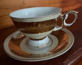 Vintage Tea Cup and Saucer Set by Inarco Lusterware Gold Opalescent
