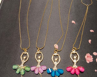 Stainless steel necklaces with ballerina pendant with cubic zirconia and Murano glass.