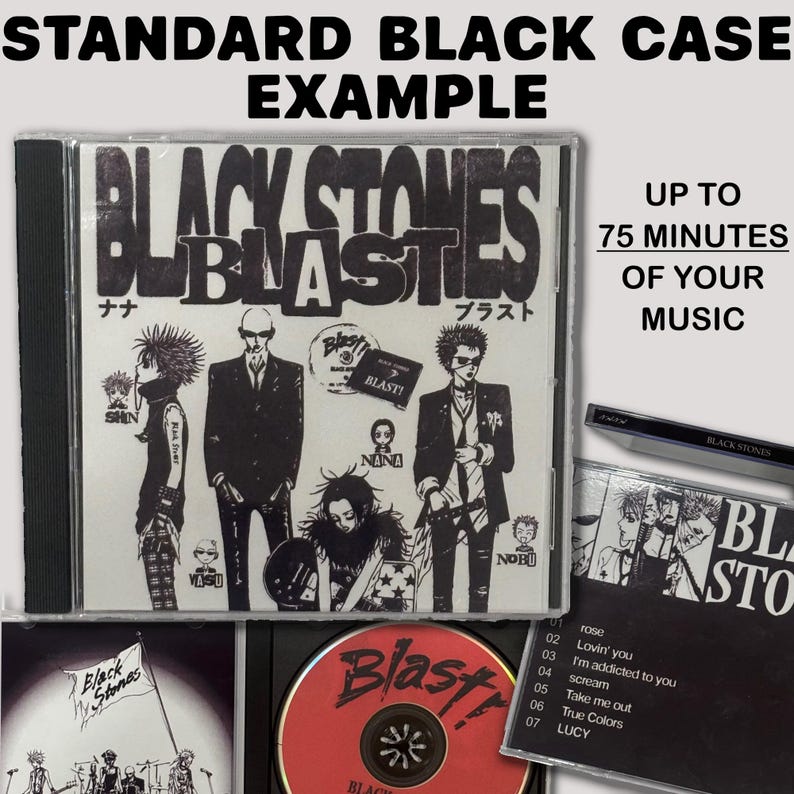 May include: A standard black CD case featuring the Black Stones Blast album cover with manga-style illustrations of characters, text reading Black Stones Blast, and a red disc. The set includes a tracklist with songs like Rose and Lucy.