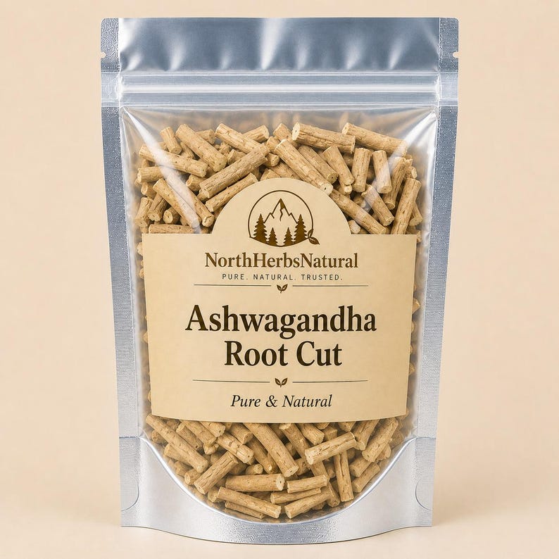 May include: A silver, resealable pouch filled with ashwagandha root cut. The label reads "North Herbs Natural" and "Ashwagandha Root Cut, Pure & Natural". The ashwagandha pieces are light brown and cylindrical.