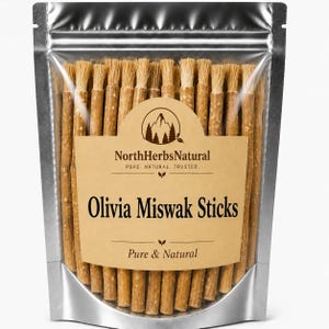 May include: A silver stand-up pouch containing multiple light brown Miswak sticks with frayed, brush-like ends. A tan label on the front features the text NorthHerbsNatural, Pure. Natural. Trusted., Olivia Miswak Sticks, and Pure & Natural.