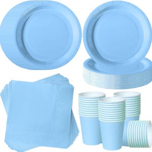 May include: A party supply set in light blue, consisting of a stack of round paper plates, a stack of square paper napkins, and multiple stacks of paper cups. All items feature a solid, uniform light blue colour throughout the entire collection.