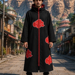 May include: A black hooded cloak featuring a full-length red front zipper and multiple red cloud motifs with white outlines. The garment has long sleeves, a high collar, and a red interior lining, extending to the mid-calf with a straight hem.