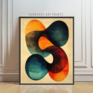 May include: Abstract art print in a black frame. The artwork features overlapping, flowing shapes in shades of orange, teal, and deep red against a beige background. The text "SURDOVAL ART PRINTS" is displayed at the top.