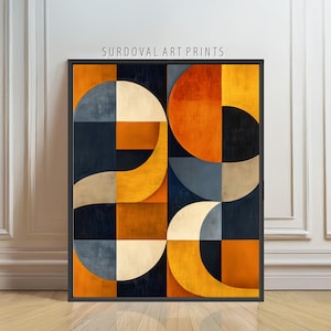 May include: Abstract geometric art print in a black frame. The artwork features a colorful design with orange, yellow, navy blue, gray, and beige shapes. The text "SURDOVAL ART PRINTS" is at the top.