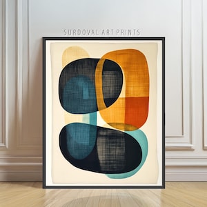 May include: Abstract art print in a black frame. The artwork features overlapping shapes in shades of navy, teal, orange, and yellow against a cream background. The text "SURDOVAL ART PRINTS" is printed at the top of the frame.