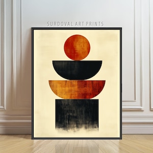May include: Abstract art print in a black frame. The artwork features a geometric design with a red circle, black and orange semi-circles, and a black rectangle. The text "SURDOVAL ART PRINTS" is at the top.
