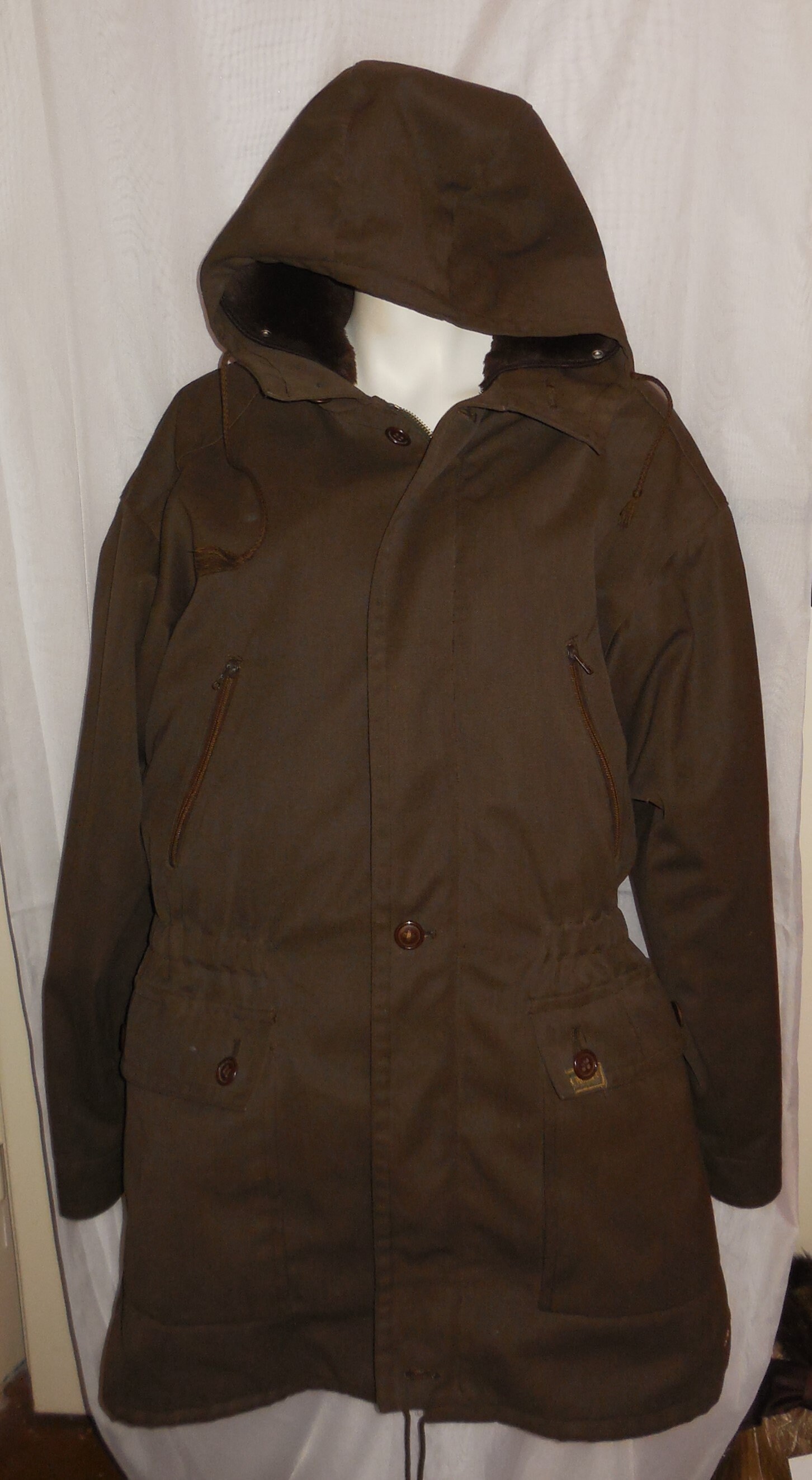 dark green jacket with hood