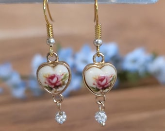 Cutesy flower in heart earrings