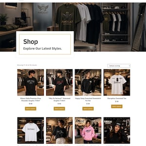 May include: A webpage display featuring a clothing store interface with a header showing an olive green t-shirt with a logo, followed by a grid of product listings including various t-shirts, sweatshirts, and hoodies with graphic prints and text.