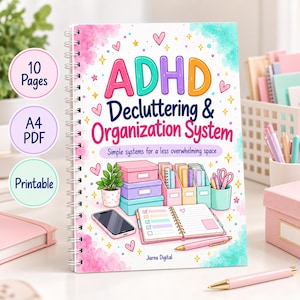 May include: A spiral-bound ADHD Decluttering & Organization System workbook with a colourful cover featuring illustrations of storage boxes, a plant, a smartphone, and a planner. The text reads ADHD Decluttering & Organization System.