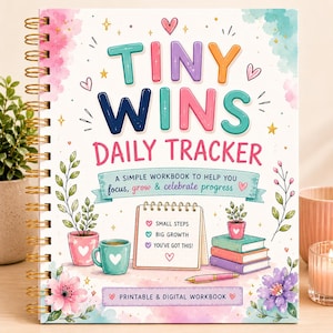 May include: A spiral-bound daily tracker workbook titled Tiny Wins with a white cover featuring colorful illustrations of potted plants, books, a coffee mug, and flowers. The text reads Tiny Wins Daily Tracker, A simple workbook to help you focus, grow & celebrate progress, Small Steps, Big Growth, You've Got This!, and Printable & Digital Workbook.