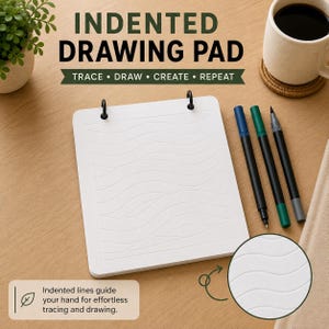 May include: A white square drawing pad with indented wavy lines, held by two black rings. Three markers in blue, green, and gray are placed to the right. The text reads INDENTED DRAWING PAD TRACE DRAW CREATE REPEAT and Indented lines guide your hand for effortless tracing and drawing.