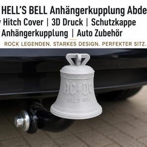 Może przedstawiać: Jasnoszara, wydrukowana w 3D osłona haka holowniczego w kształcie dzwonu, z wytłoczonym napisem AC/DC i HELL'S BELL z przodu. Osłona jest zamontowana na czarnym haku holowniczym. Tekst na obrazku: AC/DC HELL'S BELL Anhängerkupplung Abdeckung | Tow Hitch Cover | 3D Druck | Schutzkappe Anhängerkupplung | Auto Zubehör ROCK LEGENDEN. STARKES DESIGN. PERFEKTER SITZ.