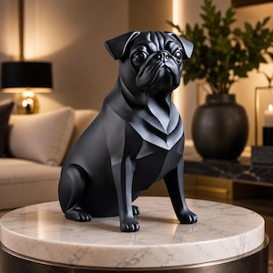 May include: A matte black sculptural figurine of a pug dog in a seated position. The sculpture features geometric, faceted surfaces that define the dog's facial wrinkles, ears, and body structure, creating a smooth, solid, and monochromatic appearance.