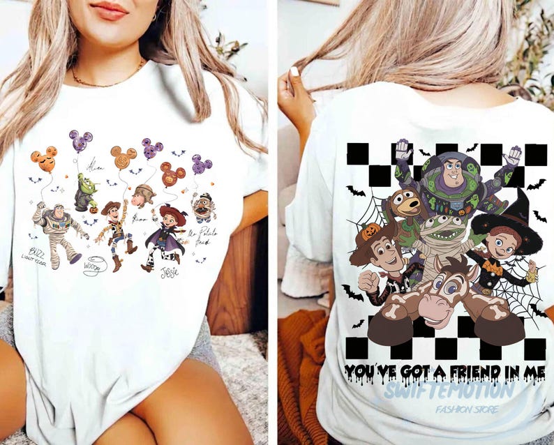 May include: A white t-shirt featuring Toy Story characters in Halloween costumes. The front displays Buzz, Woody, and Jessie with Mickey-shaped balloons. The back shows a checkered pattern with the characters and the text You've Got A Friend In Me.