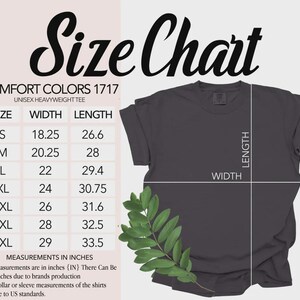 May include: A size chart for a Comfort Colors 1717 heavyweight t-shirt. The chart lists sizes S through 4XL with corresponding width and length measurements in inches. A dark grey t-shirt is displayed with white lines indicating how to measure.