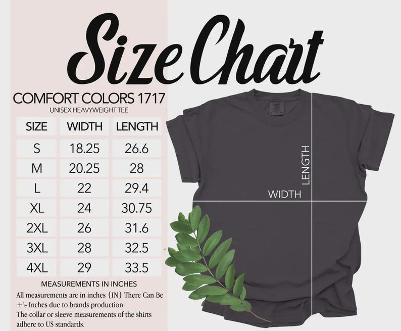 May include: A size chart for a Comfort Colors 1717 heavyweight t-shirt. The chart lists sizes S through 4XL with corresponding width and length measurements in inches. A dark grey t-shirt is displayed with white lines indicating how to measure.