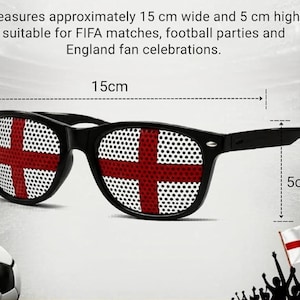 May include: Black sunglasses featuring lenses with a white and red England flag pattern. The frames measure 15 cm wide and 5 cm high. The text on the image states: Measures approximately 15 cm wide and 5 cm high, suitable for FIFA matches, football parties and England fan celebrations.