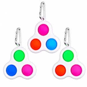 May include: Three white plastic fidget toys with a triangular shape, each featuring three colorful silicone push-pop bubbles and a silver metal carabiner clip attached to the top for hanging. The bubbles are in shades of pink, orange, blue, and green.